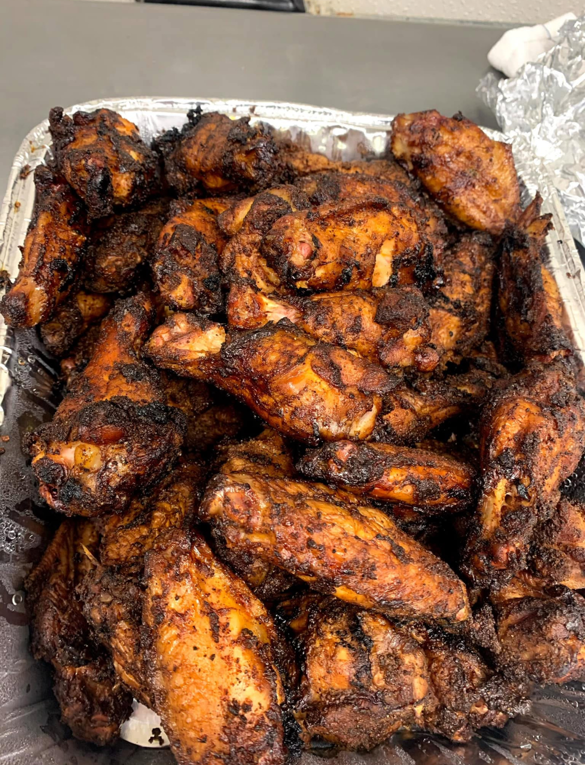 Honey BBQ Smoked Wings | Slap Yo Self BBQ — Slow-Smoked Daily in Marion, Ohio Honey barbecue smoked wings — dry-rubbed and slow-smoked crispy chicken wings with smoky honey BBQ seasoning at Slap Yo Self BBQ in Marion, Ohio